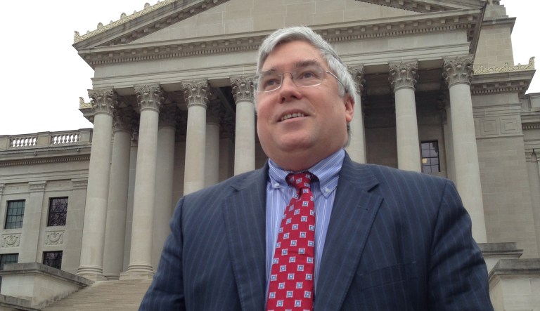 West Virginia Attorney General Patrick Morrisey is shown Thursday, March 3, 2016, outside the state Capitol in Charleston, West Virginia. Morrisey's coal-dependent state is helping lead a lawsuit against President Barack Obama's new clean-power rules. In February the U.S. Supreme Court issued a stay of the rules until legal challenges are resolved.