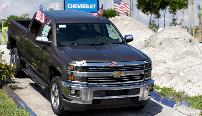 FILE - This Wednesday, Oct. 1, 2014 photo shows a 2015 Chevrolet Silverado 2500 4WD LTZ Crew Cab pickup truck at Miami Lakes AutoMall in Miami Lakes, Fla.  GM saw double-digit U.S. sales increases in August 2015 for the Chevrolet Silverado pickup and Buick SUVs, but Cadillac sales were down. 