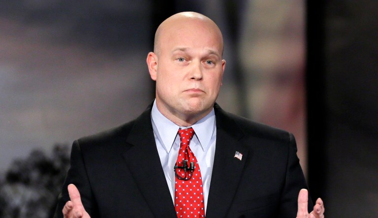 Matt Whitaker speaks during a live televised debate in Johnston, Iowa. 