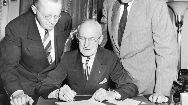 Carl Loeffler, Secretary of the Senate, certifies Senate passage over the presidential veto of the Taft-Hartley Labor Union Curbing Bill, June 23, 1947. (AP Photo)