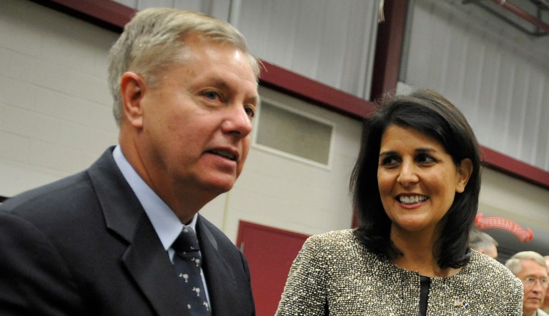 Sen. Lindsey Graham, R-S.C., and then-Gov. Nikki Haley talk before a deployment ceremony for the South Carolina Army National Guard 3/49 Agribusiness Development Team, Thursday, Jan. 10, 2013, at Ft. Jackson, S.C. 