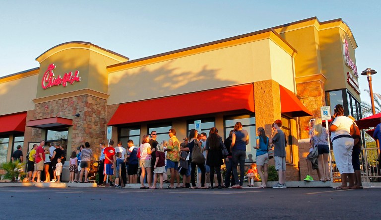 Customers gather at a Chick-fil-A restaurant.