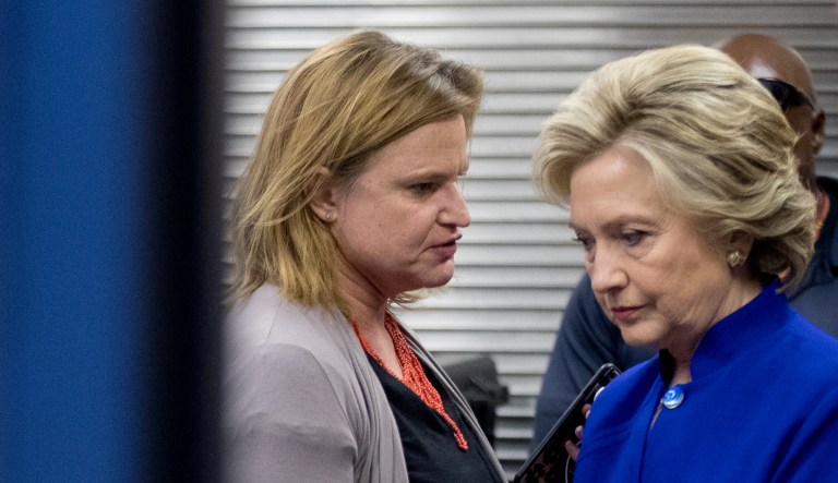 Democratic presidential candidate Hillary Clinton, right, speaks with Director of Communications Jennifer Palmieri, left, backstage before a rally in 2016.