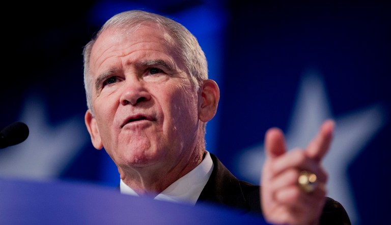 Retired Marine Lt. Col. Oliver North speaks at an event.