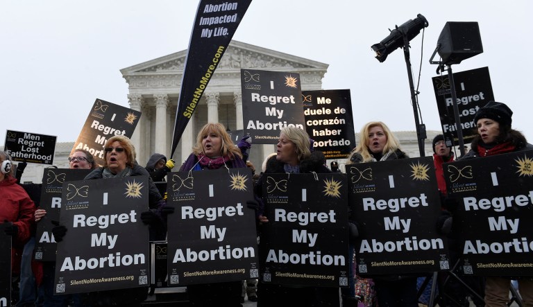 Anti-abortion supporters rally outside the Supreme Court in Washington, Friday, Jan. 22, 2016, during the March for Life 2016, the annual rally held on the anniversary of 1973 'Roe v. Wade' U.S. Supreme Court decision legalizing abortion.