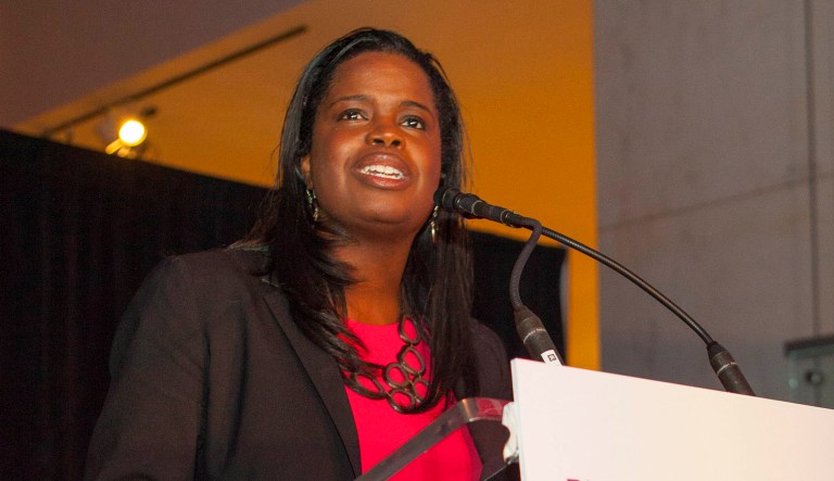 Kimberly Foxx speaks at an event.