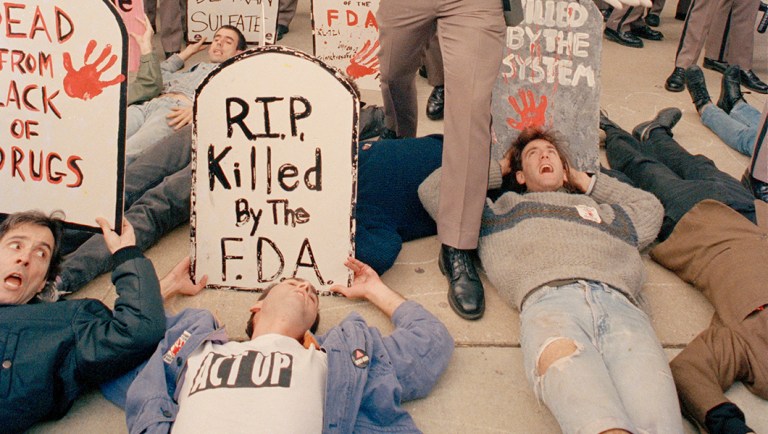 Demonstrators from the organization ACT UP, angry with the federal government's response to the AIDS crisis, protest in front of the headquarters of the Food and Drug Administration, Oct. 11, 1988.