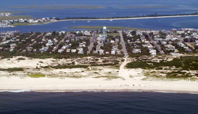 This July 11, 2014 aerial photo shows the coast of Barnegat Light, N.J., part of Long Beach Island. A seismic testing that blasted the ocean floor off Long Beach Island with sound waves to study climate change was completed on July 6, 2015. 