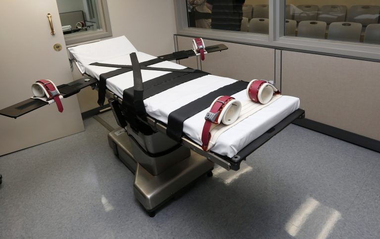 This Thursday, Oct. 9, 2014 file photo shows the gurney in the the execution chamber at the Oklahoma State Penitentiary in McAlester, Okla.