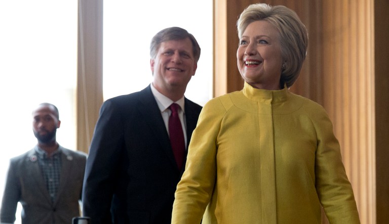 Democratic presidential candidate Hillary Clinton arrives with former United States Ambassador to Russia Michael McFaul to speak about counterterrorism at the Bechtel Conference Center at Stanford University, in Stanford, Calif., Wednesday, March 23, 2016.