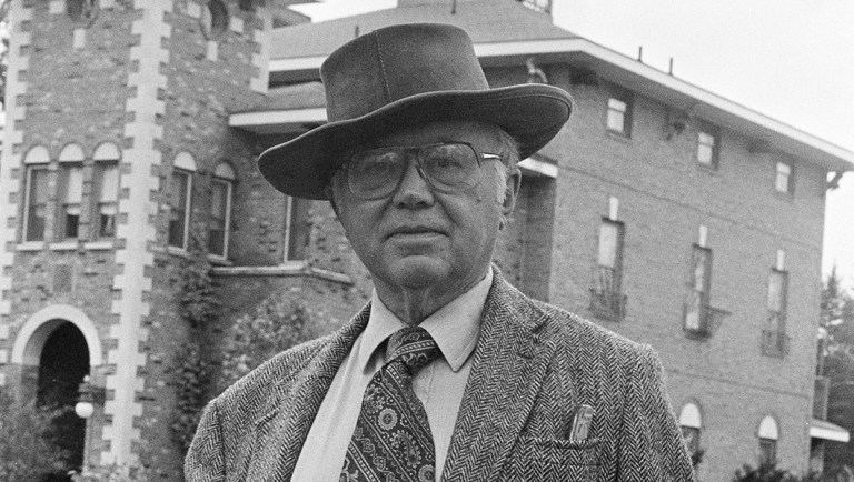 Russell Kirk, shown in front of his Italianate home in Mecosta, Mich.