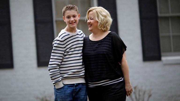 Carson Luke, left, still has nightmares about the time he was shut inside a concrete seclusion room at his Chesapeake school and emerged with a broken hand and foot. 