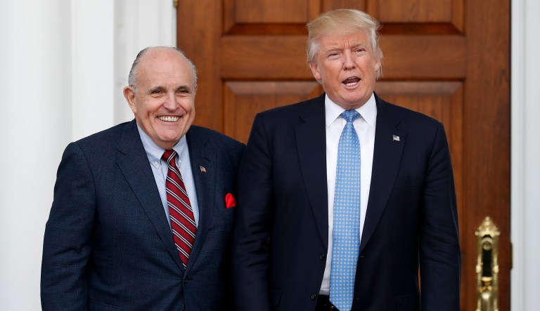 Donald Trump and Rudy Giuliani are seen.