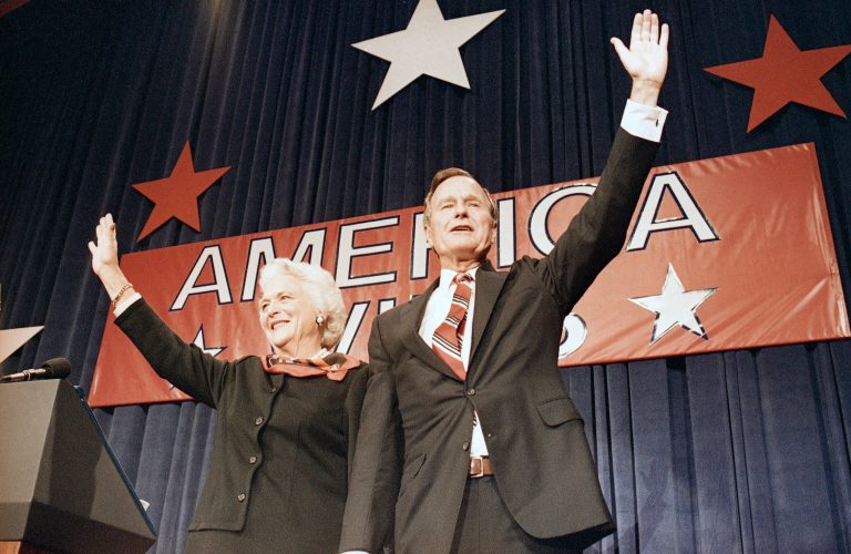 President-elect George H.W. Bush and his wife Barbara Bush wave to the crowd at a victory celebration rally, Tuesday, Nov. 8, 1988, Houston, Texas.