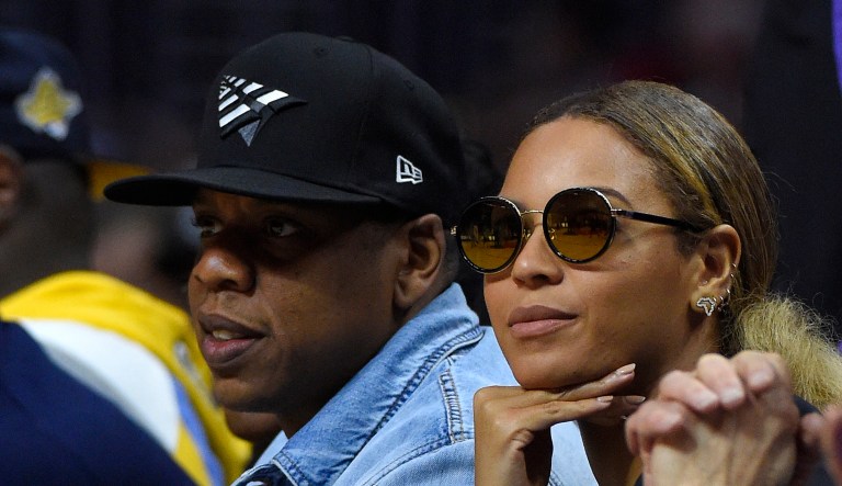 Singers Jay Z (left) and Beyonce attend an event in Los Angeles.