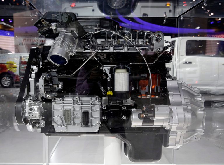 A 6.7L Cummins Diesel engine is displayed at the Ram booth during the media preview of the Chicago Auto Show at McCormick Place  in Chicago on Thursday, Feb. 6, 2014. The Chicago Auto Show will be open to the public February 8 through February 17.