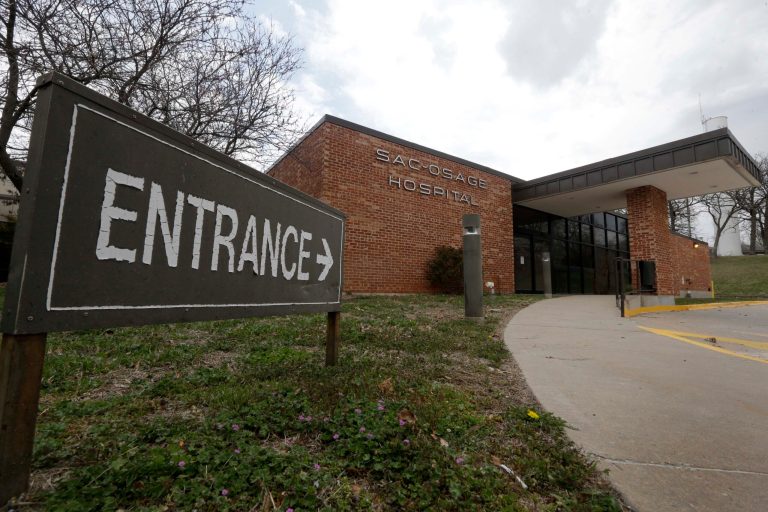 In this Wednesday, April 1, 2015 photo, closed and out of service, the entrance to Sac-Osage Hospital stands empty in Osceola, Mo. After 45 years of providing health are in rural western Missouri, Sac-Osage Hospital is being sold piece-by-piece.
