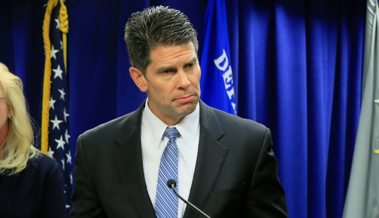 David Bowdich takes questions at news conference.