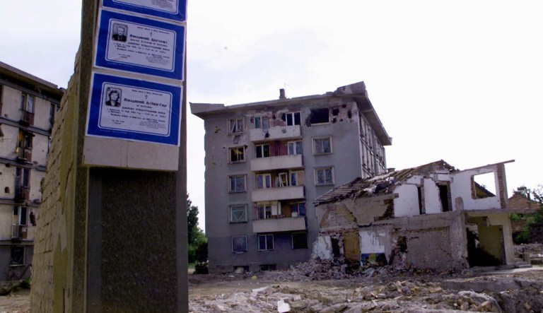 Obituary notices announcing the death of three residents who were killed during a NATO attack are attached to ruins, in Aleksinac, 180 km (110 MILES) South-West of Belgrade, Wednesday May 19, 1999.    