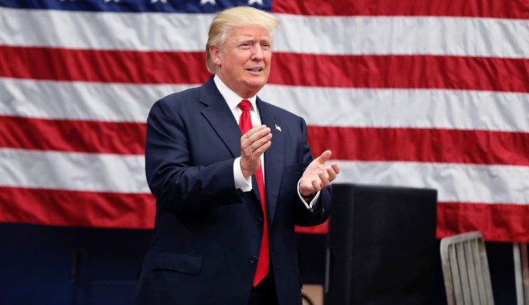 Republican presidential candidate Donald Trump arrives to speak at a campaign rally in Akron, Ohio, Monday, Aug. 22, 2016.