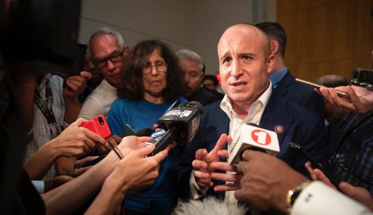 U.S. Rep. Max Rose speaks to reporters after a town hall meeting, Wednesday, Oct. 2, 2019, at the Joan and Alan Bernikow Jewish Community Center in the Staten Island borough of New York.