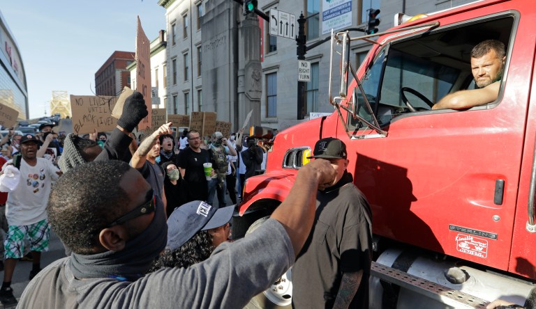 Amid protests, truckers determined not to become the next Reginald Denny