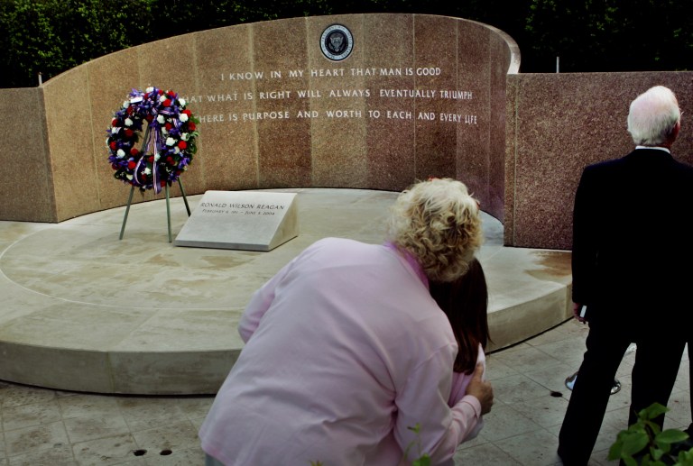 The worlds on Gipper's grave provide a healing message for today's politics, said the Washington director of the Ronald Reagan Presidential Foundation and Institute.