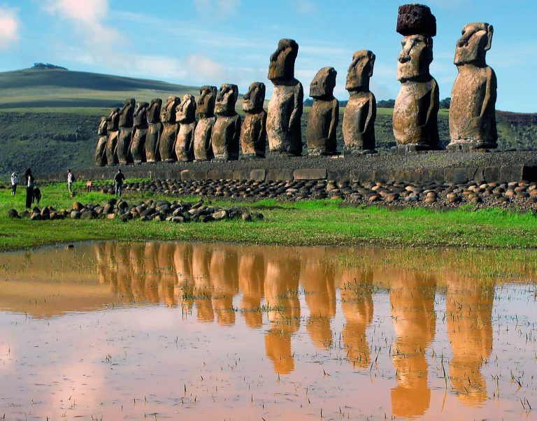 Giant volcanic rock statues called Moais are shown on Easter Island in the South Pacific.