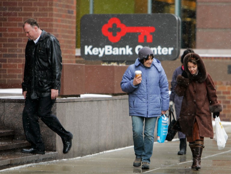 In this Jan. 22, 2008 file photo, pedestrians walk past the KeyBank Center in downtown Cleveland. 