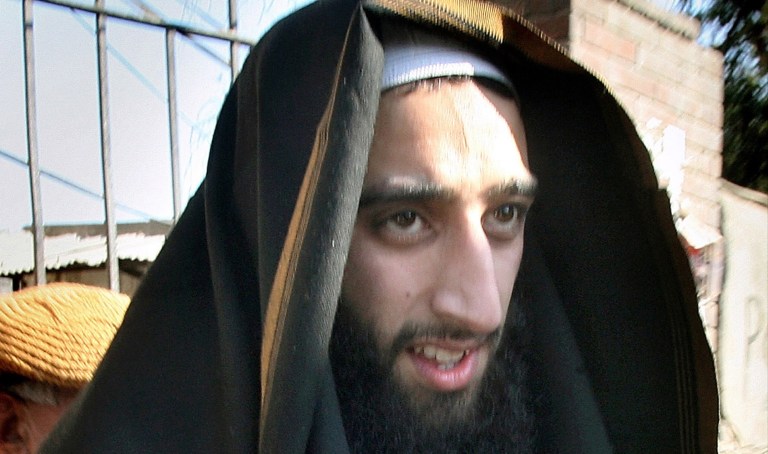 In this Dec. 22, 2006, file photo, Rashid Rauf is escorted by Pakistani police officers, unseen, to appear in court in Rawalpindi, Pakistan.