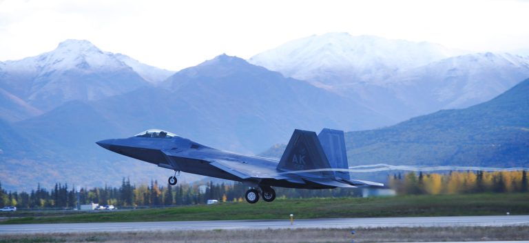 An Air Force F-22 Raptor stealth fighter takes off from Joint Base Elmendorf-Richardson in Anchorage, Alaska.  