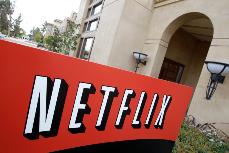 Netflix announced it will begin cracking down on and charging for account sharing beginning early 2023. This March 20, 2012 file photo shows signage at Netfilx headquarters in Los Gatos, California. 