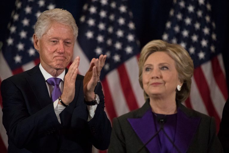 Former President Bill Clinton applauds as his wife, Democratic presidential candidate Hillary Clinton speaks in New York, Wednesday, Nov. 9, 2016, where she conceded her defeat to Republican Donald Trump after the hard-fought presidential election. Polls showed she would win.