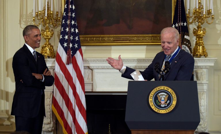 Vice President Joe Biden, right, speaks as President Barack Obama, left, listens during a ceremony in the State Dining Room of the White House in Washington, Thursday, Jan. 12, 2017. Obama surprised Biden and presented him with the Presidential Medal of Freedom.