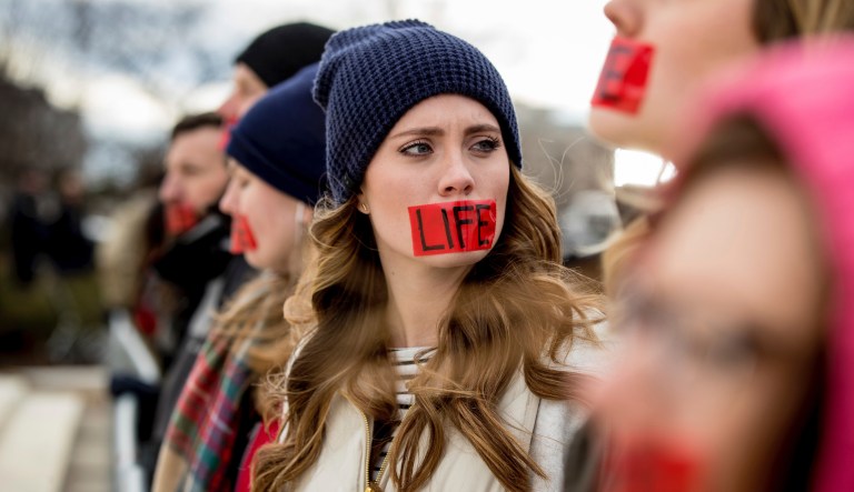 Pro-life activists converge in front of the Supreme Court in Washington, Friday, Jan. 27, 2017, during the annual March for Life. Thousands of anti-abortion demonstrators gathered in Washington for an annual march to protest the Supreme Court's landmark 1973 decision that declared a constitutional right to abortion.