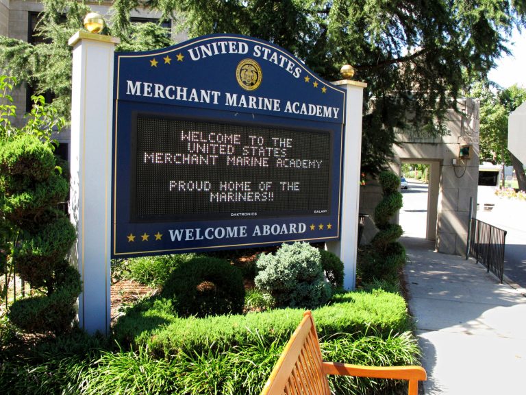In this Sept. 13, 2016, file photo, a sign welcomes visitors at the entrance to the U.S. Merchant Marine Academy in Kings Point, New York.
