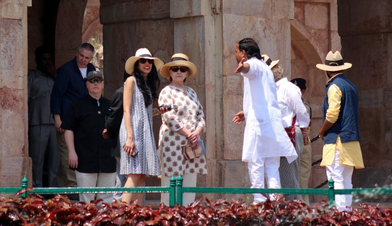 Former U.S. Secretary of State Hillary Clinton visits the Jahaz Mahal monument in Madhya Pradesh, India.