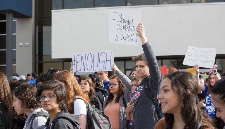 High school students and teachers participated in a walk out as a way to memorialize the 17 people killed at Marjory Stoneman Douglas and protest for stricter gun control laws in the country, Wednesday.