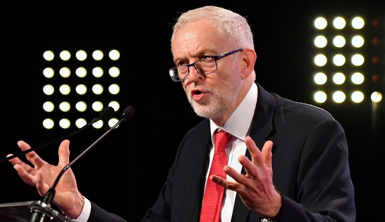 Britain's Labour Party leader Jeremy Corbyn delivers a speech prior to a meeting of European Socialists prior to an EU summit in Brussels.