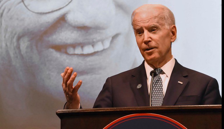 Former U.S. Vice President Joe Biden talks in a ballroom at Duquesne University, Friday, March 16, 2018, in Pittsburgh. Biden talked about Rooney's impact on Pittsburgh, Ireland, the NFL and himself, during the "Slainte! Celebrating the Life and Legacy of Daniel M. Rooney" event. 