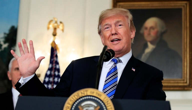 President Trump speaks in the Diplomatic Room of the White House in Washington. 
