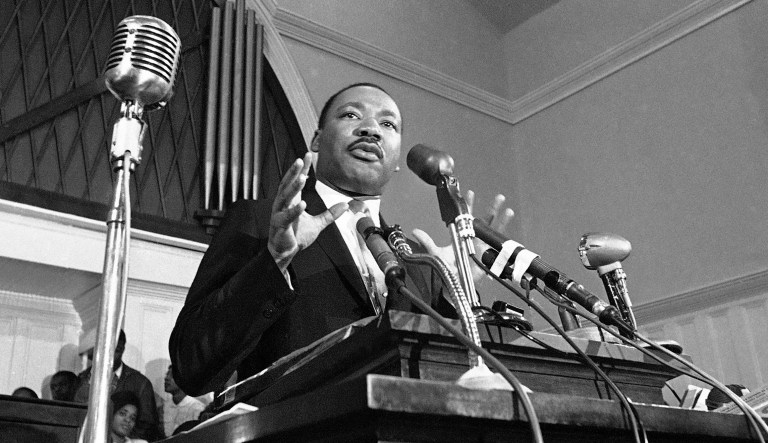 In this 1960 file photo, Martin Luther King Jr. speaks in Atlanta. The civil rights leader had carried the banner for the causes of social justice â organizing protests, leading marches and making powerful speeches exposing the scourges of segregation, poverty and racism. 