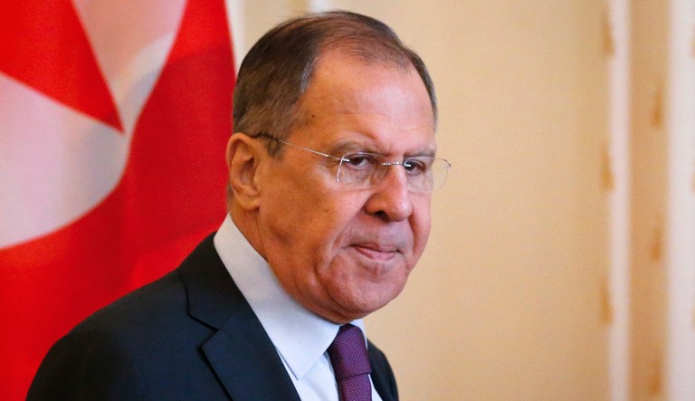 Russian Foreign Minister Sergey Lavrov enters a hall during a meeting in Moscow, Russia, Tuesday, April 10, 2018. 