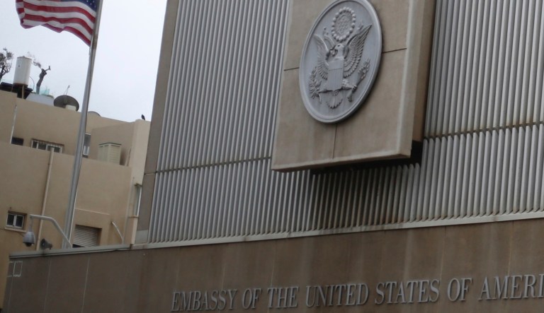 The American flag flies at the U.S embassy building in Tel Aviv, Israel. When the Stars and Stripes are hoisted over the new U.S. Embassy in Jerusalem next month it will be a physical milestone in a broader, striking shift by the Trump administration. 