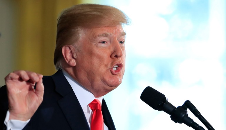 President Trump speaks during an event in the East Room of the White House. 