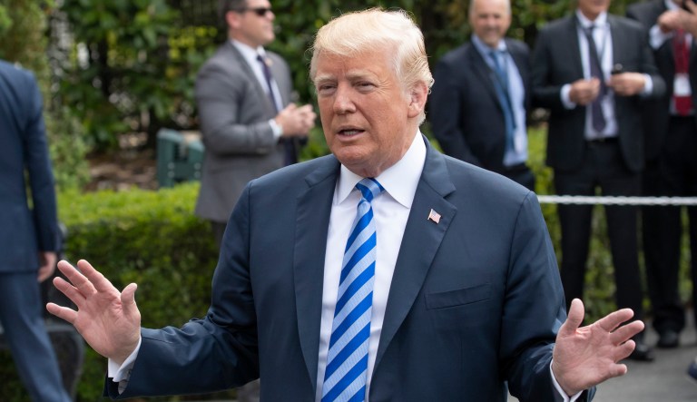 President Trump talks to the media as he leaves for Dallas.  