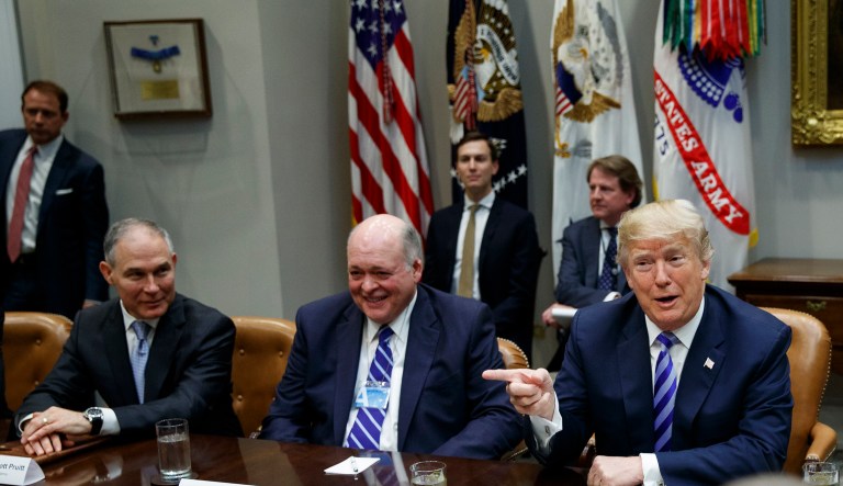 President Trump speaks during a meeting with automotive executives in the White House. From left, Environmental Protection Agency Administrator Scott Pruitt, Ford CEO James Hackett, and Trump. 