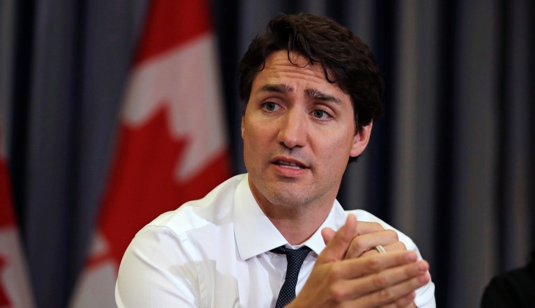 Prime Minister Justin Trudeau gestures during a roundtable discussion with members of the Canadian Technology Accelerator in Cambridge, Mass.