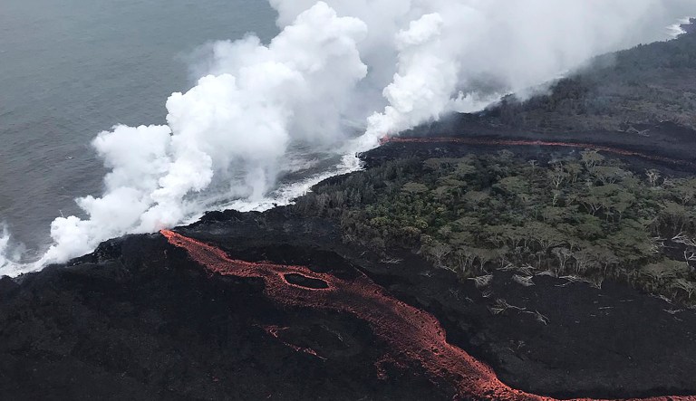 Lava from Hawaii's Kilauea volcano is pouring into the sea and setting off a chemical reaction that creates giant clouds of acid and fine glass.