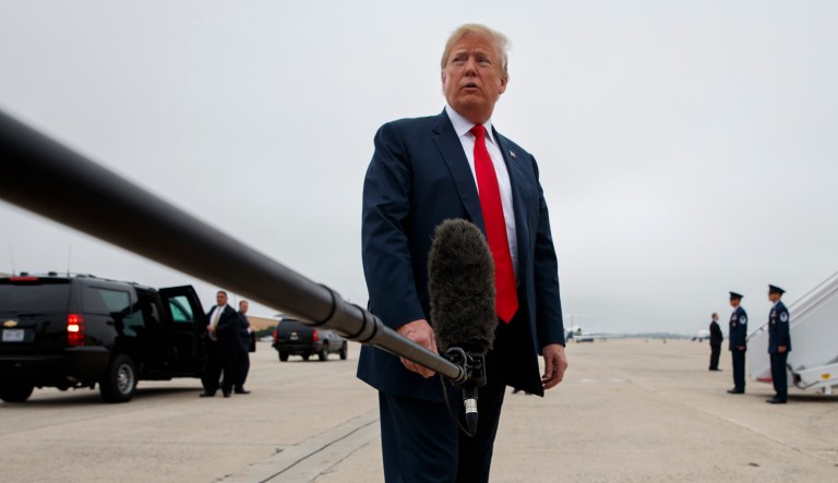 President Trump talks with reporters before boarding Air Force One. 